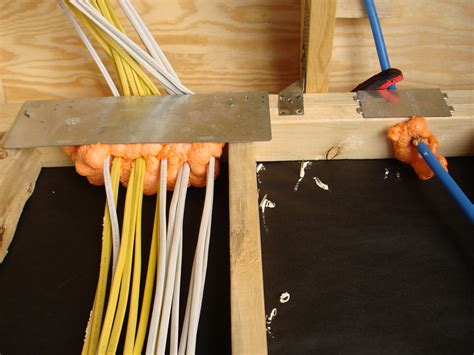 filling gaps around electrical junction boxes in cieling|sealing electrical wiring holes.